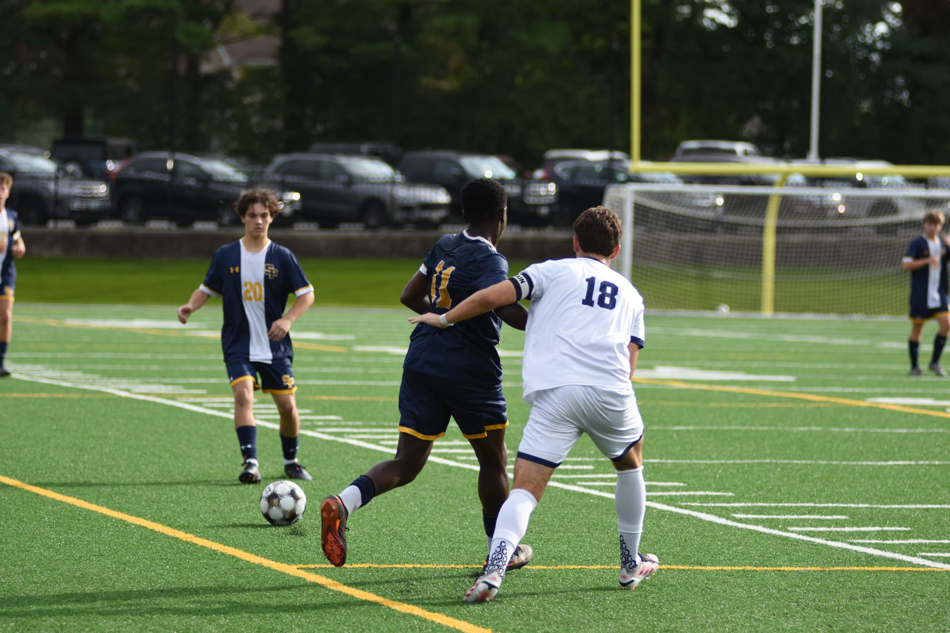 St. Paul's number 11 battles for the ball