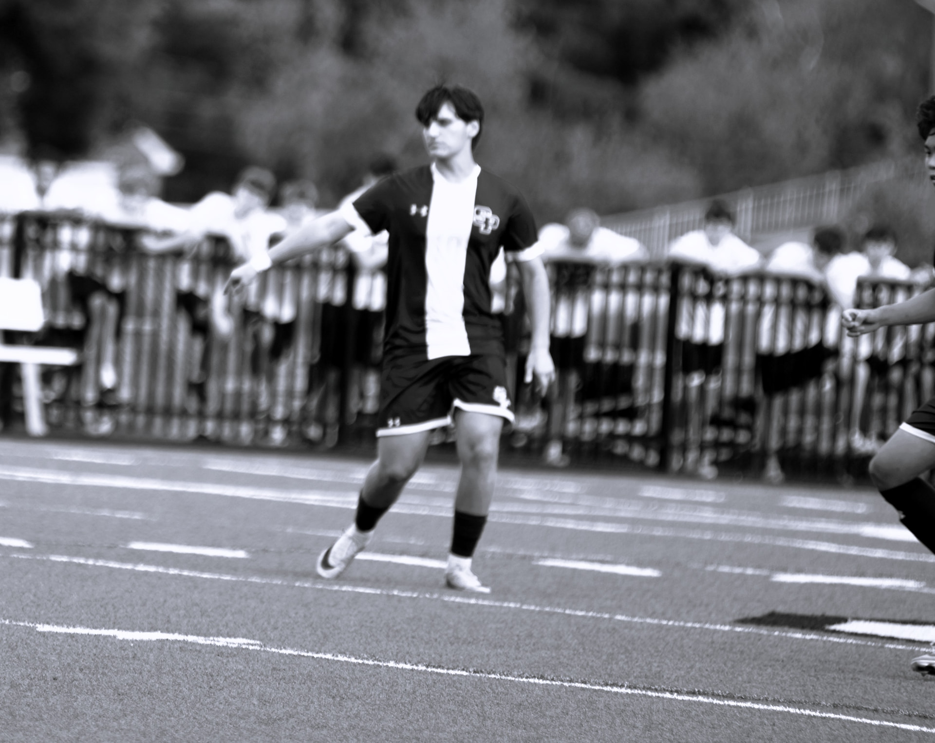 St. Paul's player directs play in black and white