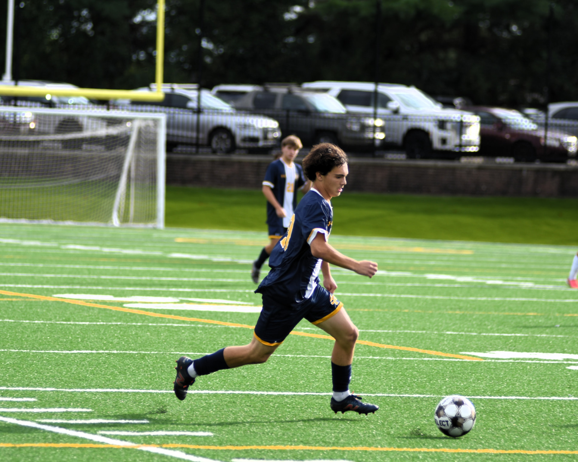 St. Paul's player chases down the ball