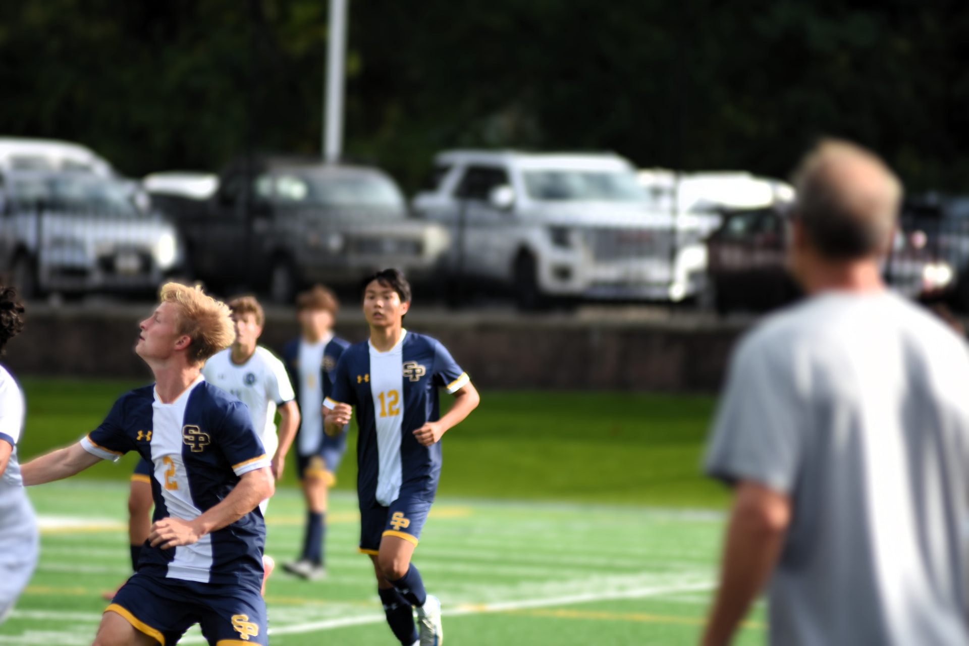 St. Paul's players track a ball in the air