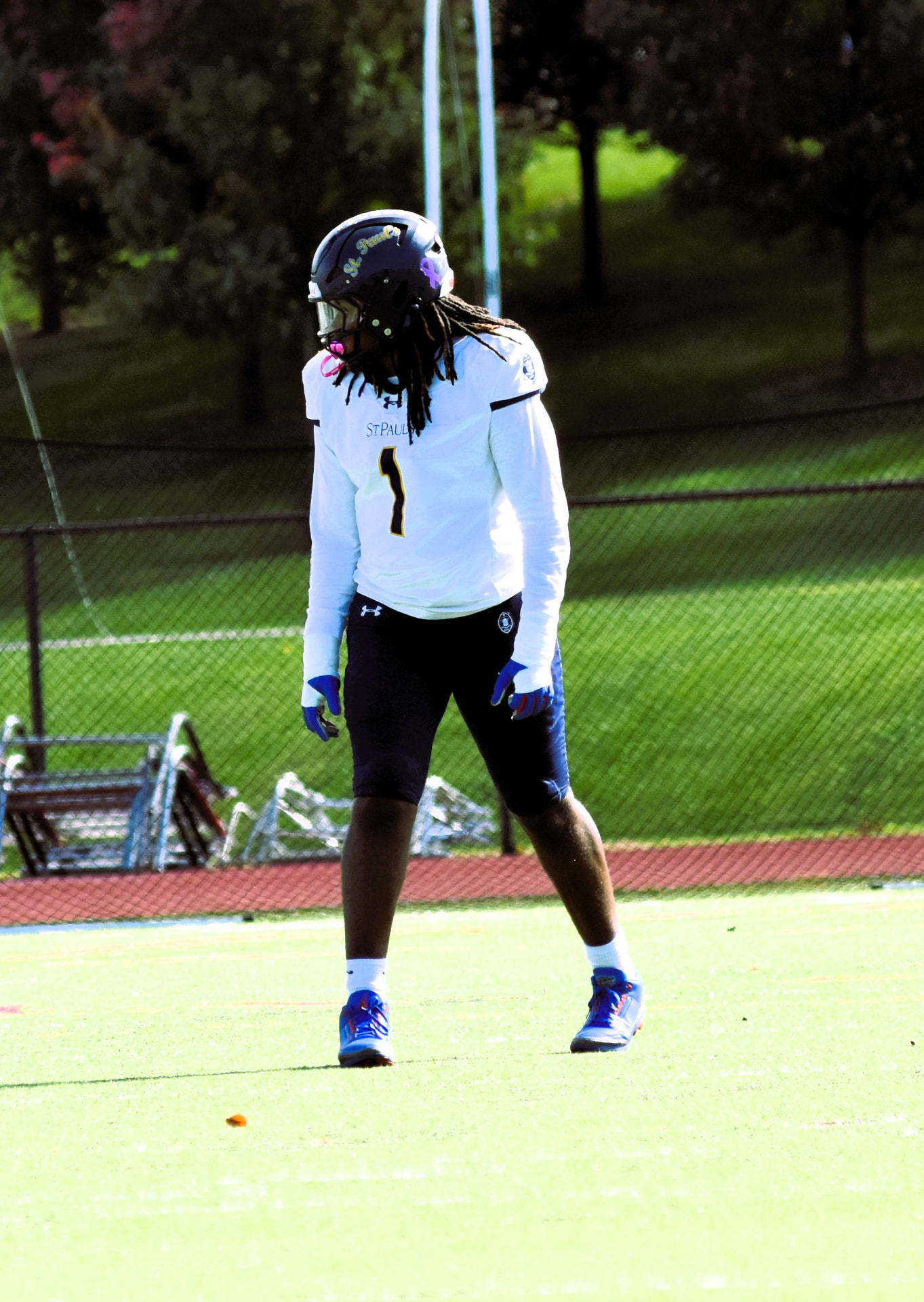 Crusaders number 1 waits on the field against Curley