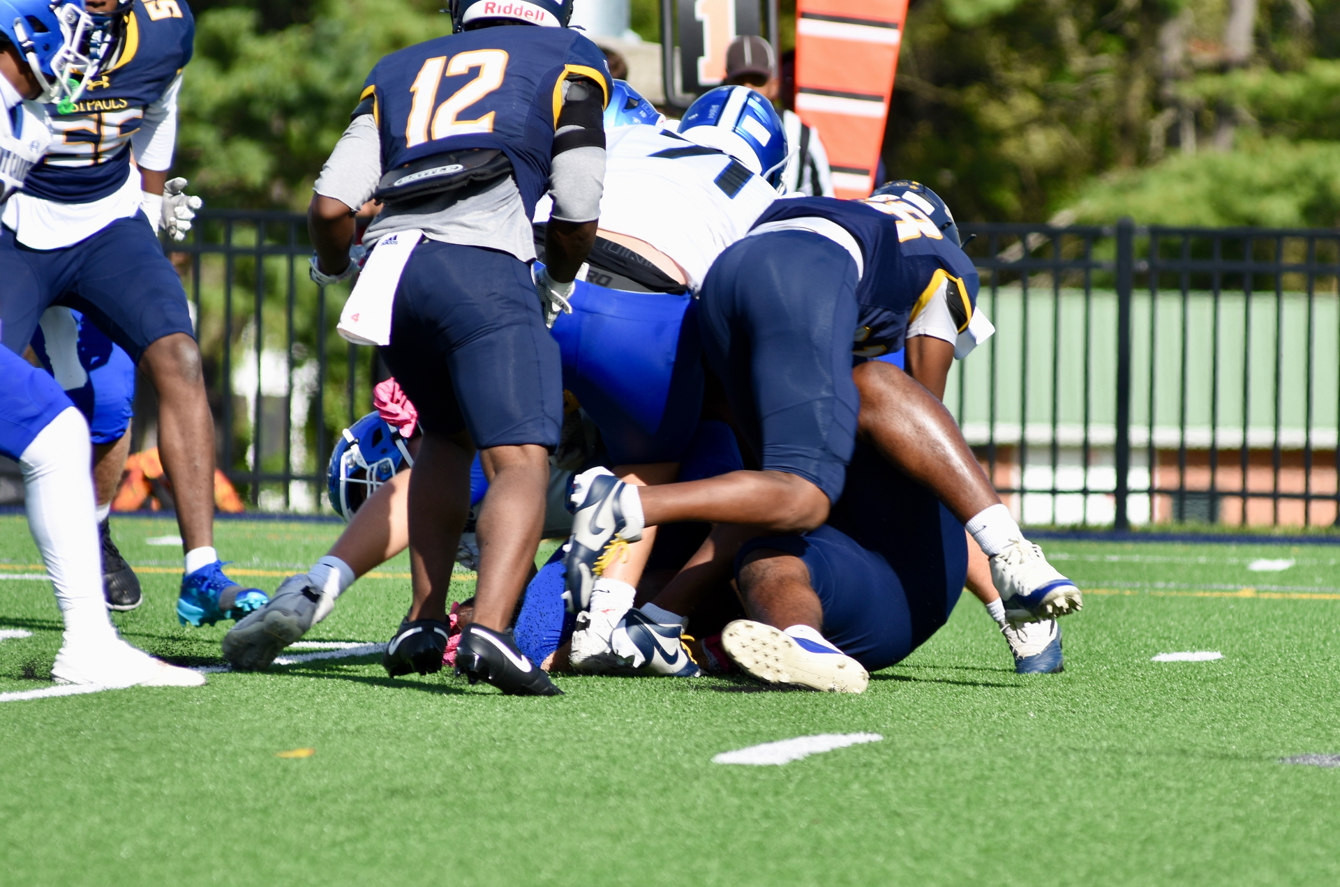 St. Paul's defense piling on the tackle